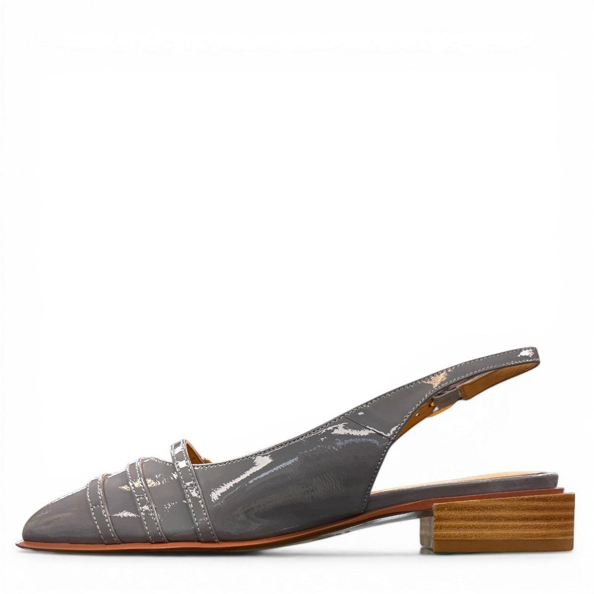 DJANGO & JULIETTE Eshano denim blue patent leather slingback flat with triple buckle detail and low heel. left view.