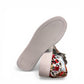 Django & Juliette Leithah leather sneakers featuring a colorful collage print and white platform sole. bottom view.