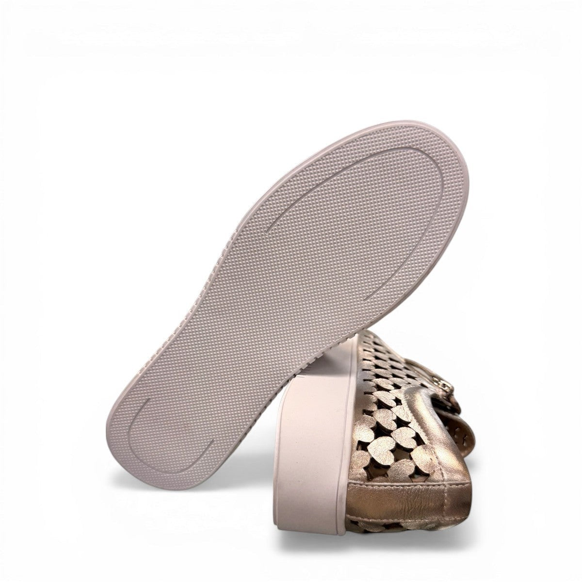 Django & Juliette Leithah metallic gold leather sneakers with heart-shaped cutouts and side zippers. bottom view.