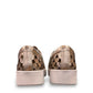 Django & Juliette Leithah metallic gold leather sneakers with heart-shaped cutouts and side zippers. back view.