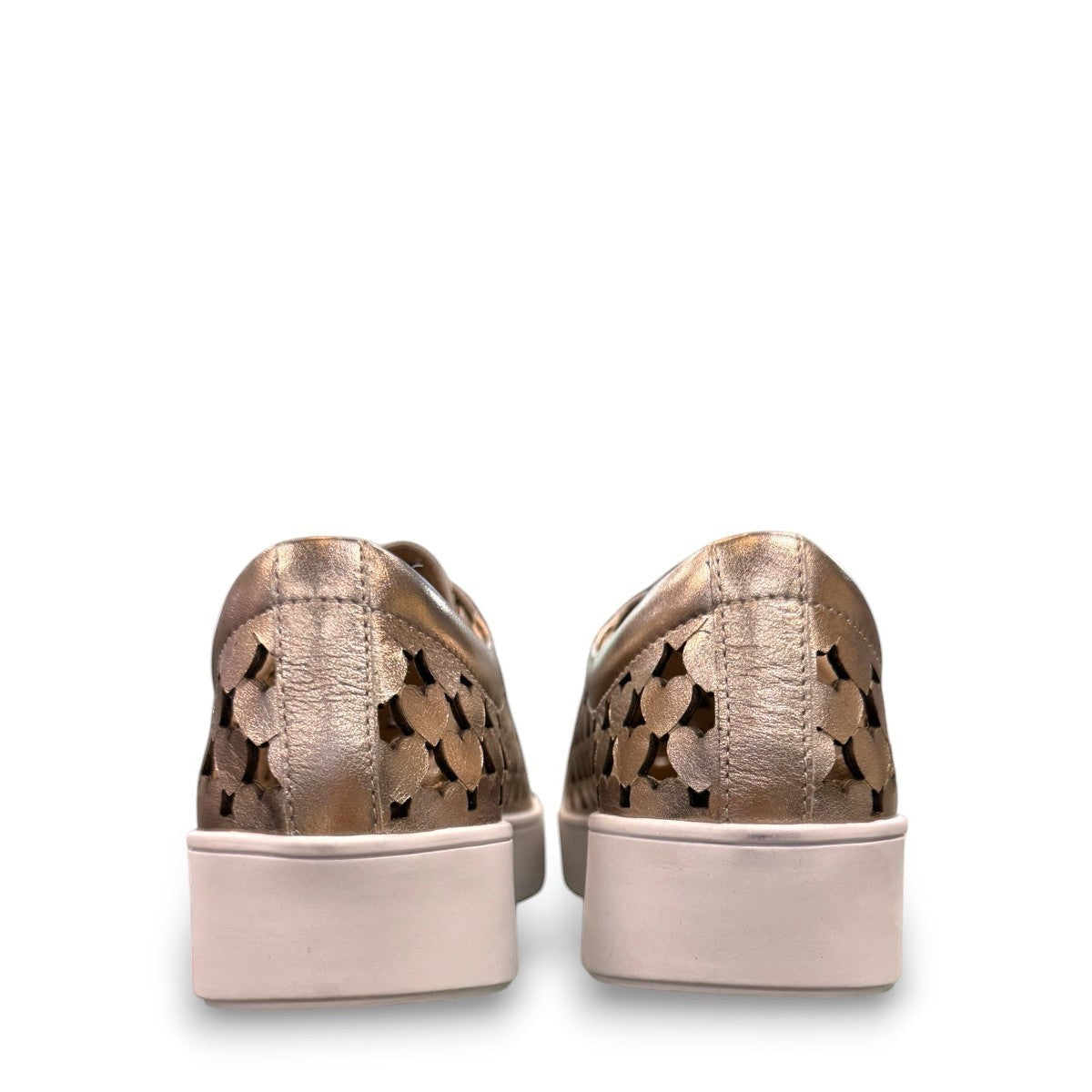 Django & Juliette Leithah metallic gold leather sneakers with heart-shaped cutouts and side zippers. back view.