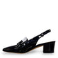 Django & Juliette navy patent leather slingback loafers with a 2-inch block heel and adjustable strap.
left view.