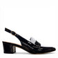 Django & Juliette navy patent leather slingback loafers with a 2-inch block heel and adjustable strap. 
right view.
