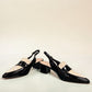 Django & Juliette Aiday black and ivory patent leather slingback block heel shoe with adjustable strap. front view.
