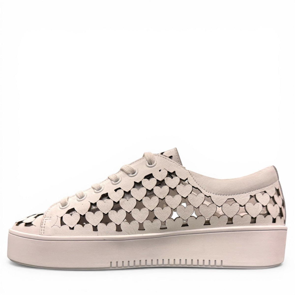 Django & Juliette white leather platform sneakers with heart-shaped laser cutouts and side zipper. left view.