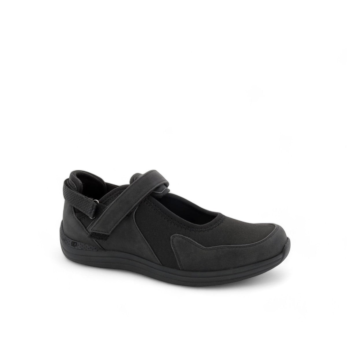 Drew Buttercup black stretch orthopedic shoe showing the slip-resistant textured rubber outsole