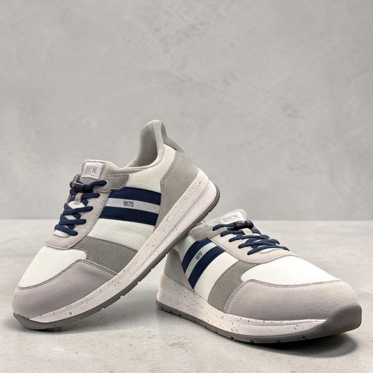 Drew Connor white combo suede casual shoe showing the slip-resistant rubber outsole and rocker bottom.