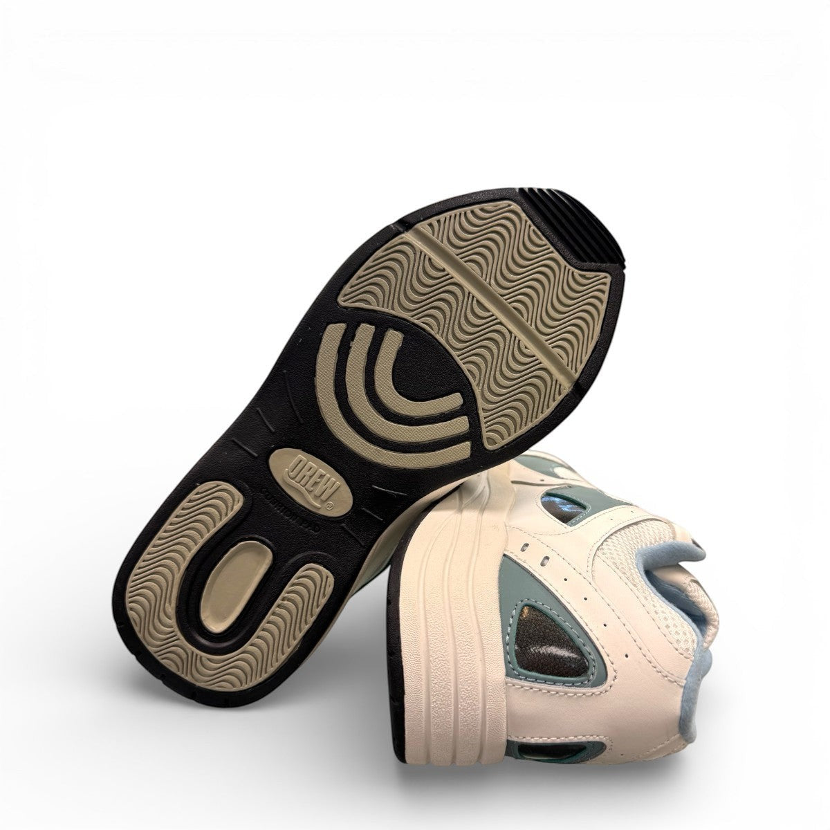 Drew Flare athletic shoes in white and blue with a durable rubber rocker bottom outsole. orthopedic shoe