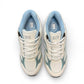 Drew Flare athletic shoes in white and blue with a durable rubber rocker bottom outsole. orthopedic shoe
