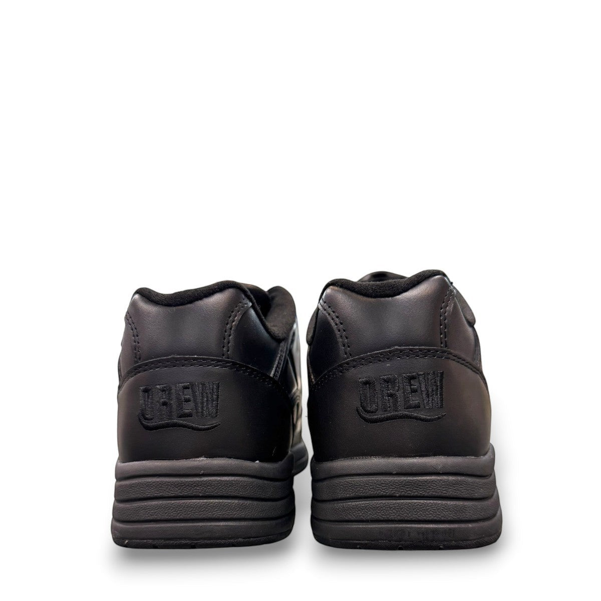 Drew Force V black  calf leather athletic shoe showing the durable rubber outsole and heel cushion pad