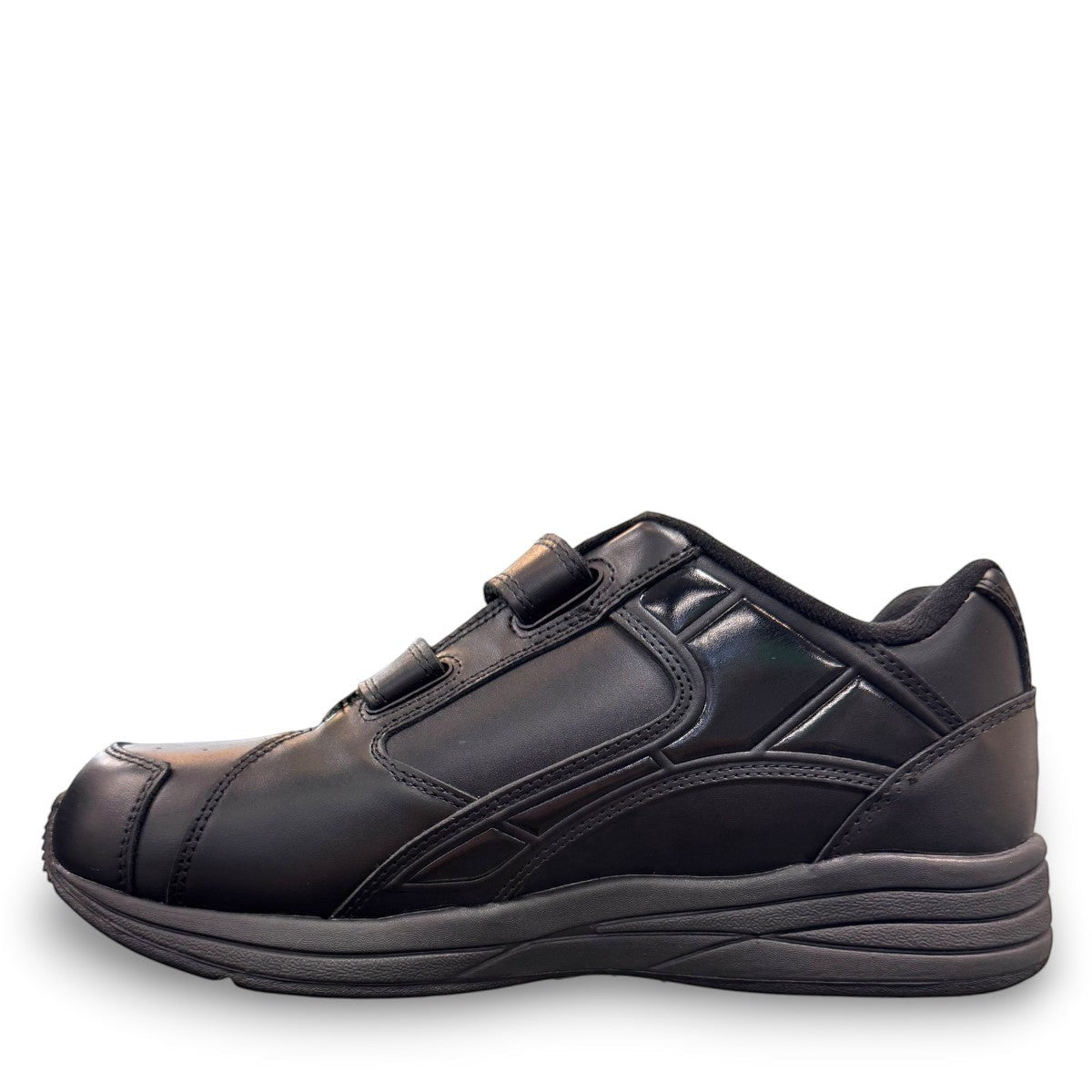Drew Force V black  calf leather athletic shoe showing the durable rubber outsole and heel cushion pad