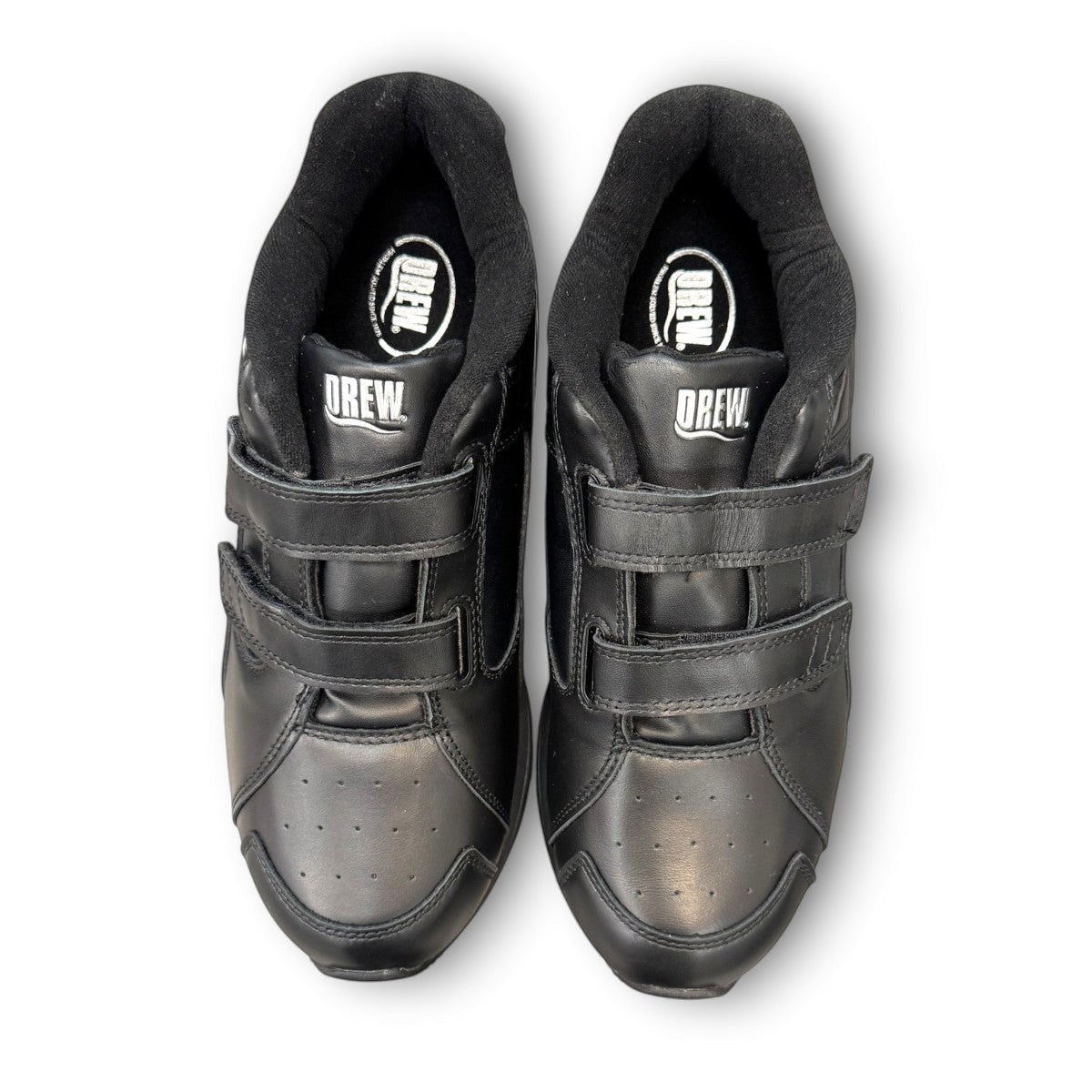 Drew Force V black  calf leather athletic shoe showing the durable rubber outsole and heel cushion pad