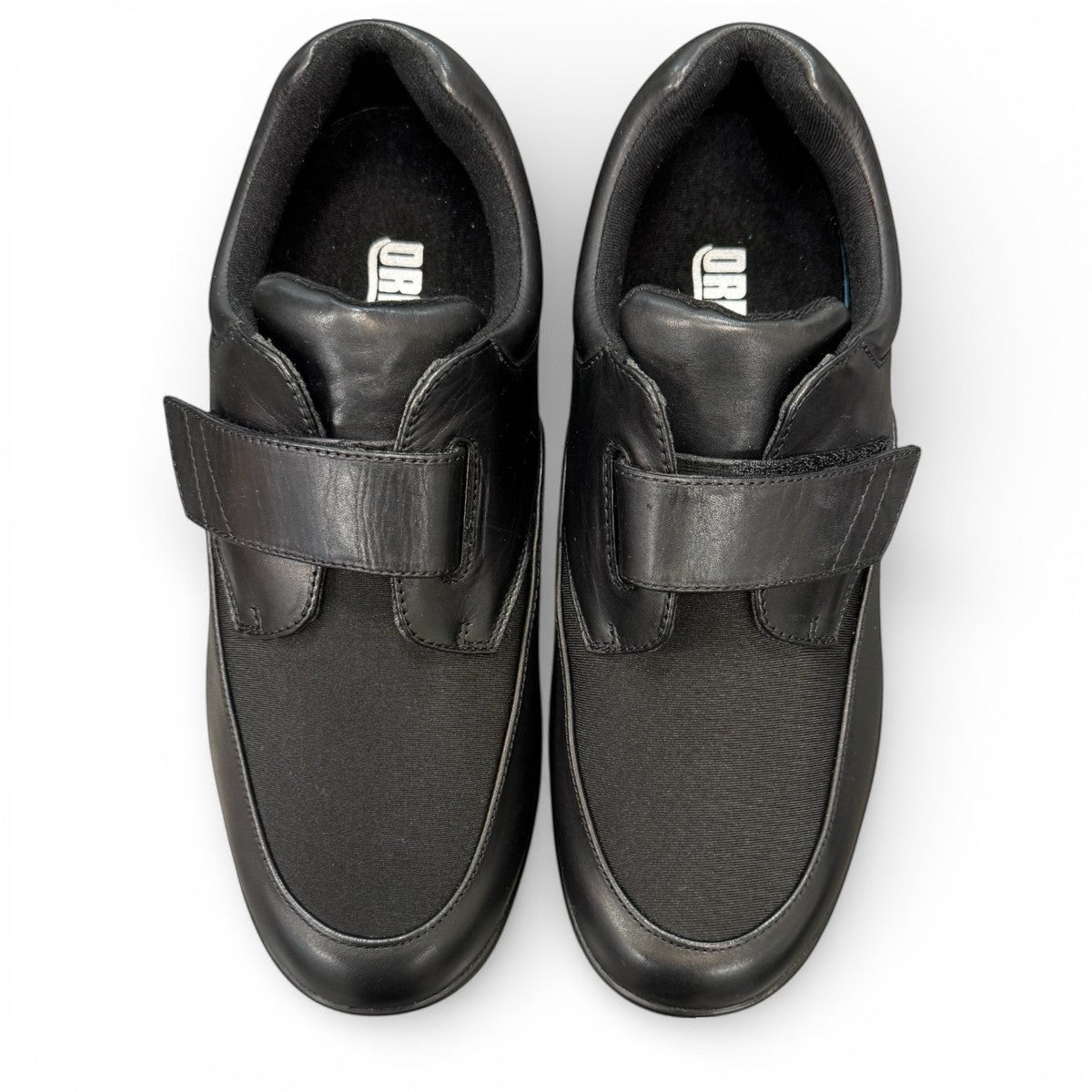 Drew Journey II black orthopedic shoe showing the durable polyurethane rocker bottom sole