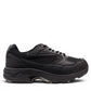 Drew Lance black mesh orthopedic walking shoe showing the durable rubber rocker bottom outsole