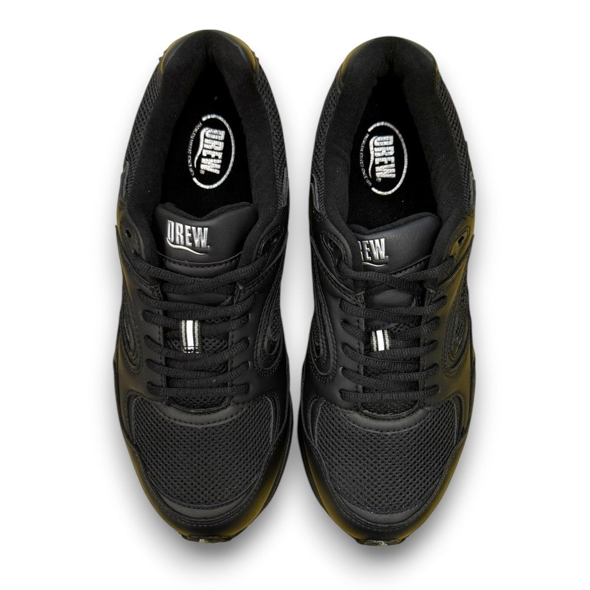 Drew Lance black mesh orthopedic walking shoe showing the durable rubber rocker bottom outsole