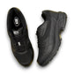 Drew Lance black mesh orthopedic walking shoe showing the durable rubber rocker bottom outsole