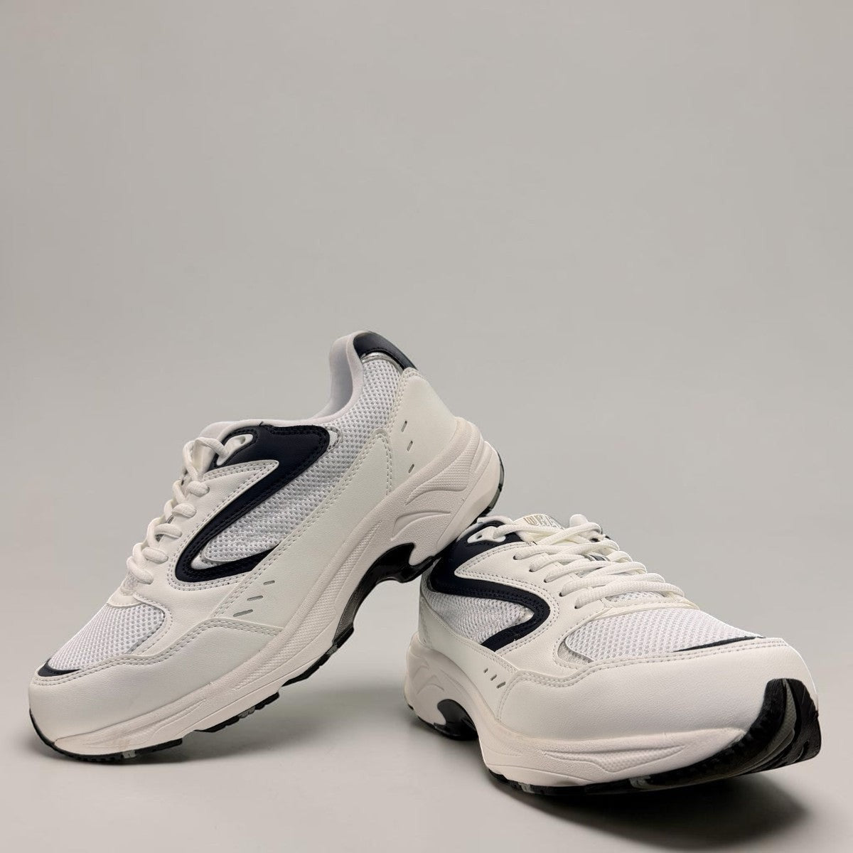 Drew Lance white mesh combo-orthopedic walking shoe with dual shank stability and rocker bottom sole.