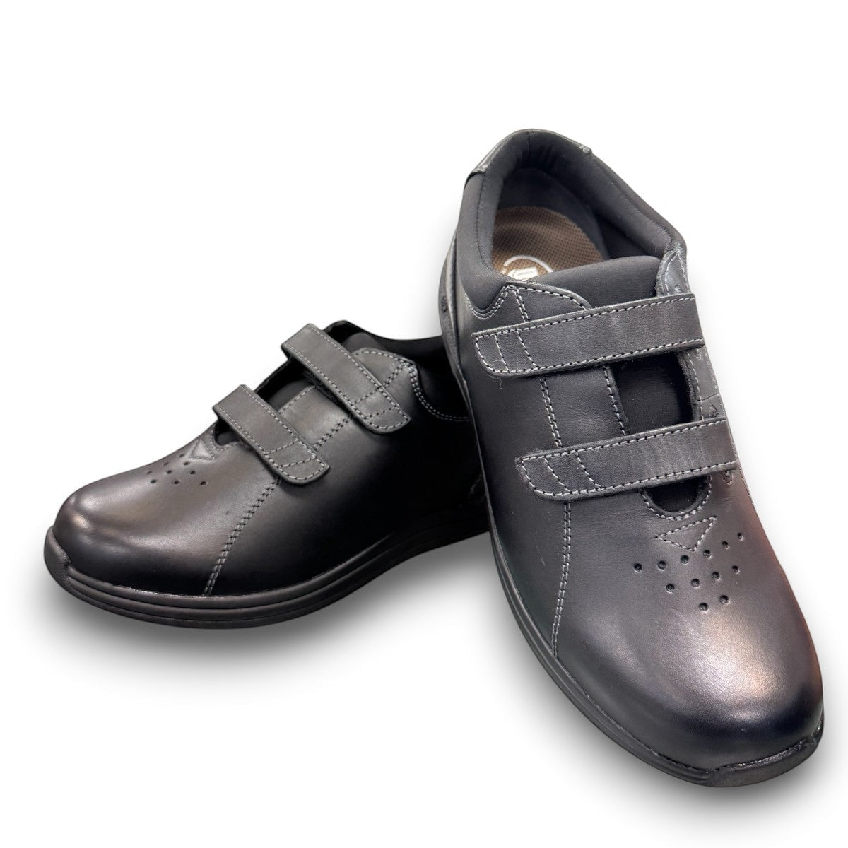 Drew Lotus black calf leather casual shoe showing the slip-resistant rubber outsole and heel detail