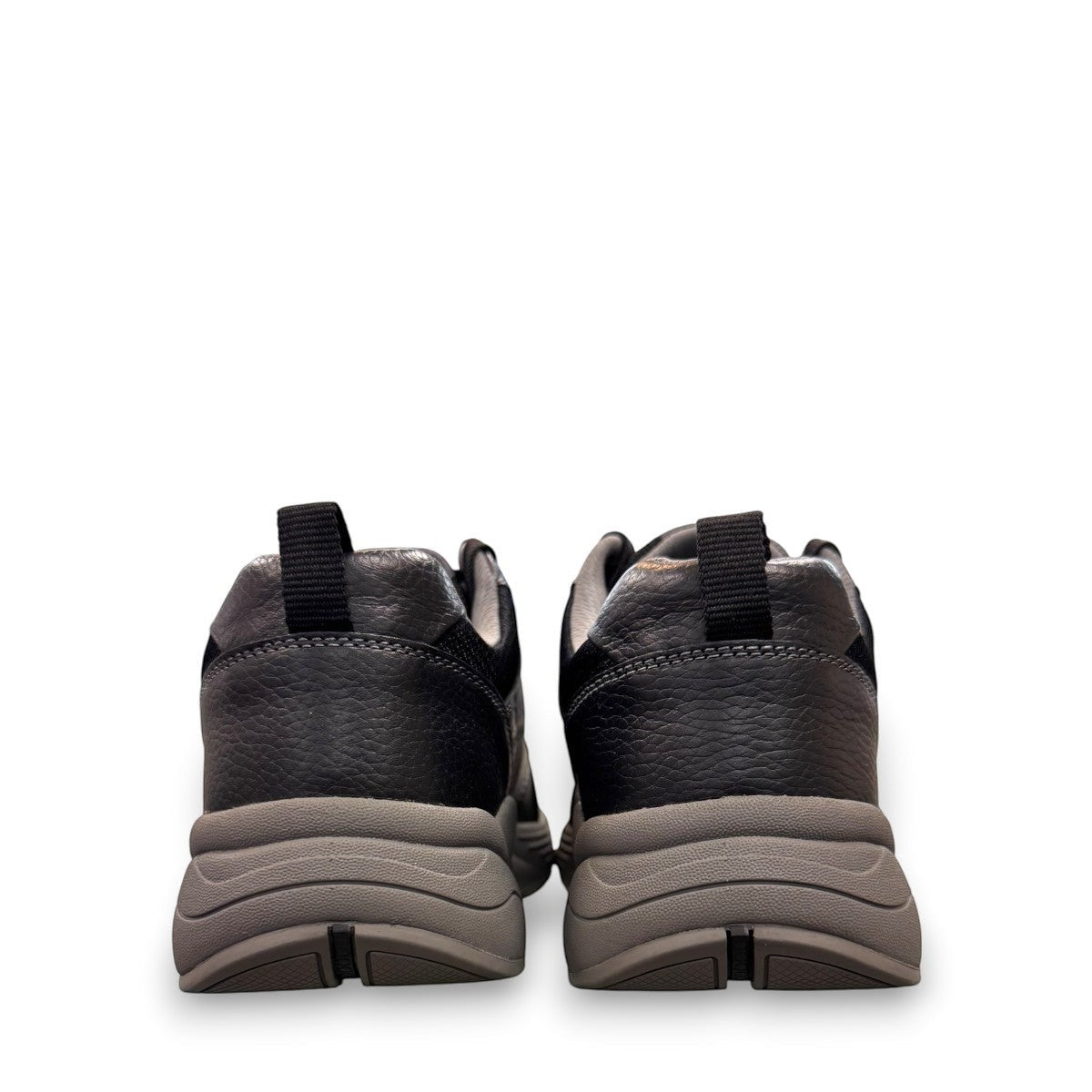 Drew Maker black pebbled leather casual shoe showing the slip-resistant rubber rocker bottom outsole