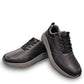 Drew Maker black pebbled leather casual shoe showing the slip-resistant rubber rocker bottom outsole