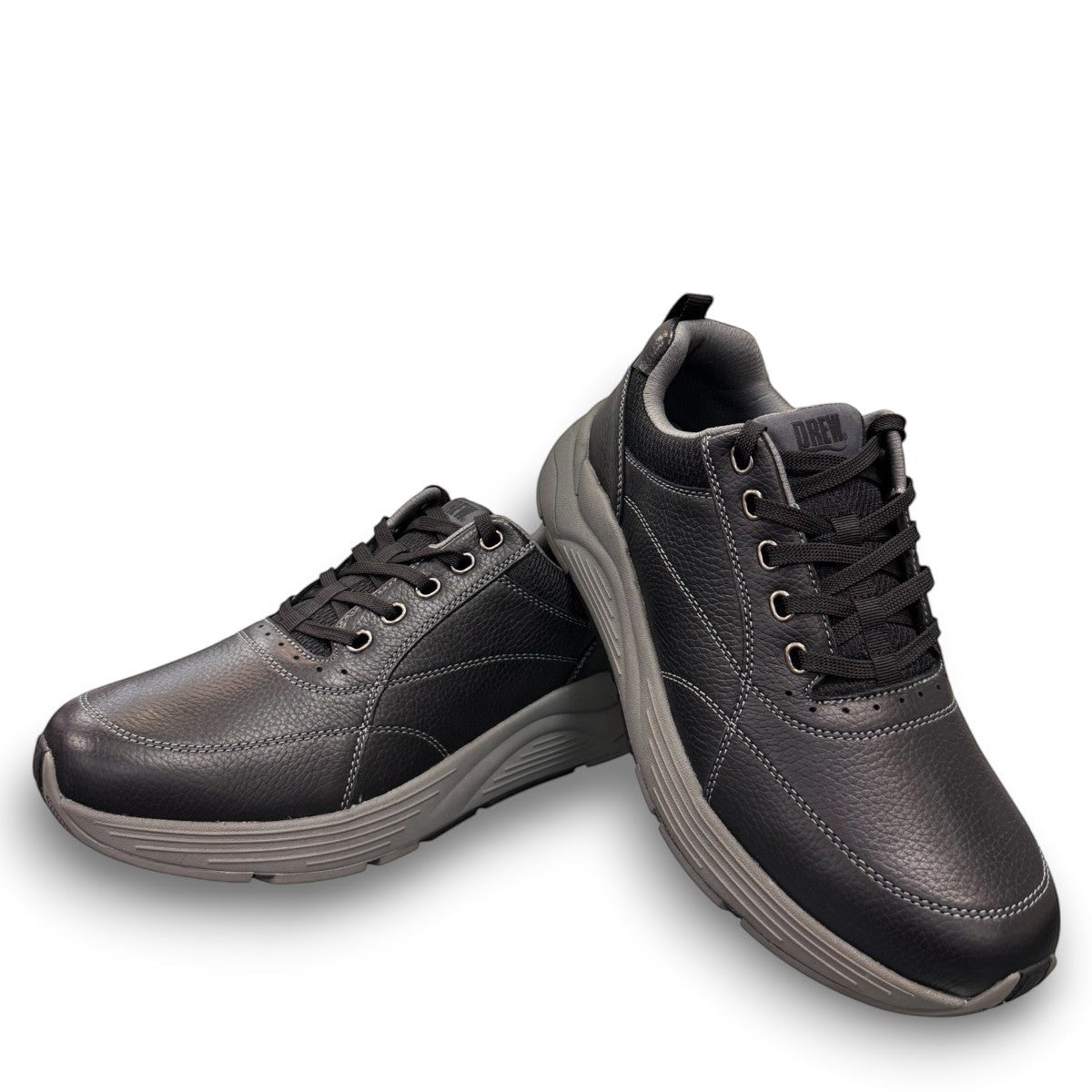 Drew Maker black pebbled leather casual shoe showing the slip-resistant rubber rocker bottom outsole