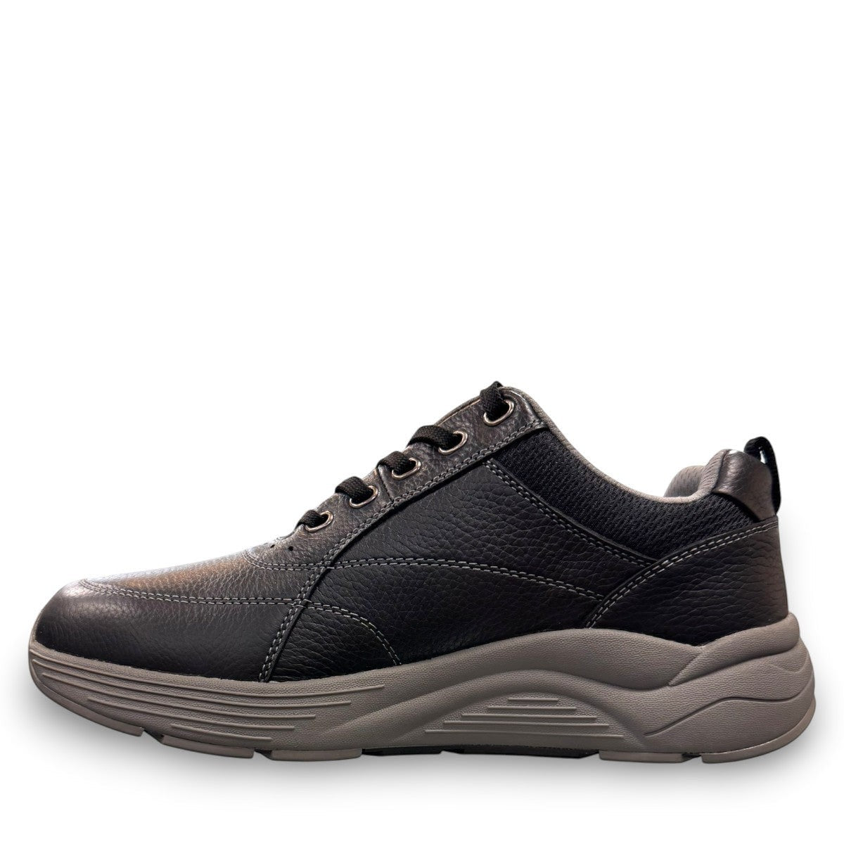Drew Maker black pebbled leather casual shoe showing the slip-resistant rubber rocker bottom outsole