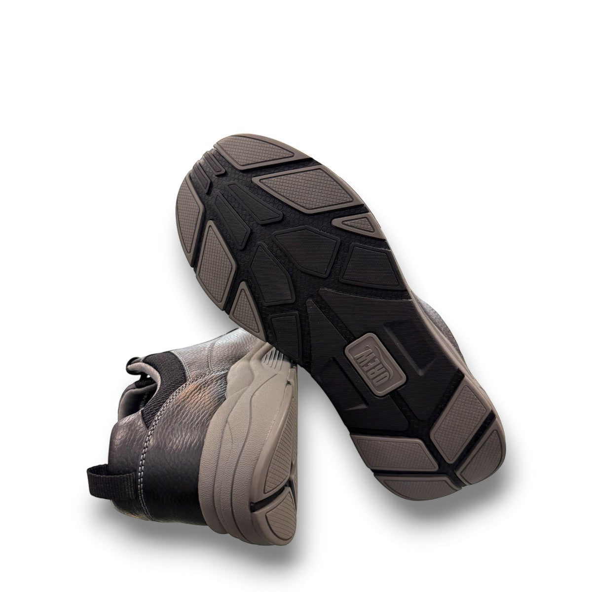 Drew Maker black pebbled leather casual shoe showing the slip-resistant rubber rocker bottom outsole