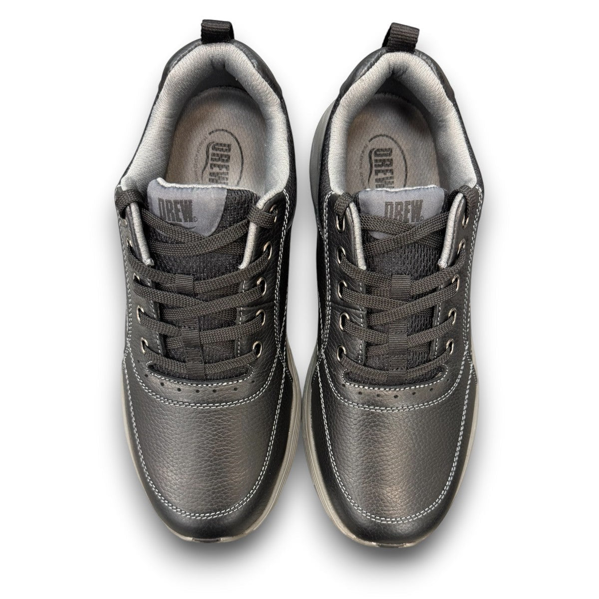 Drew Maker black pebbled leather casual shoe showing the slip-resistant rubber rocker bottom outsole