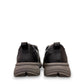 Drew Match black pebbled leather slip-on shoe showing the textured rubber rocker bottom outsole