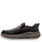 Drew Match black pebbled leather slip-on shoe showing the textured rubber rocker bottom outsole