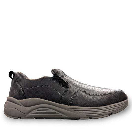 Drew Match black pebbled leather slip-on shoe showing the textured rubber rocker bottom outsole