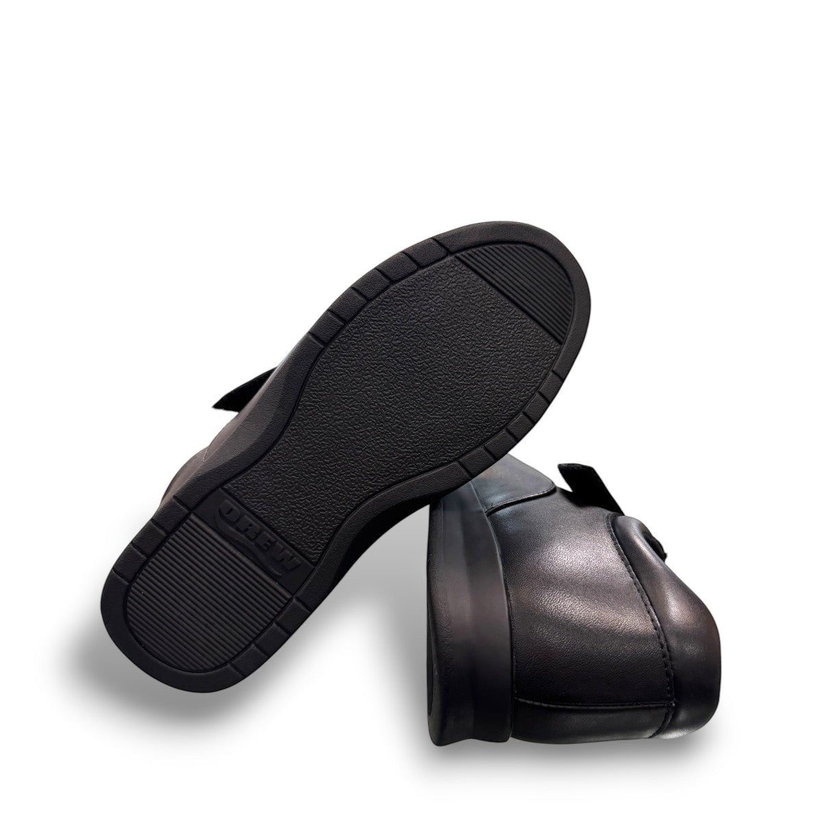 Drew Quest black leather and stretch casual shoe showing the durable polyurethane rocker outsole.   orthopedic shoe