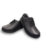 Drew Tour black leather oxford shoe showing the textured slip-resistant polyurethane outsole. orthopedic shoe