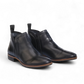 EOS Melborn Gaid black leather ankle boots featuring elastic side gussets and a pull tab on a rubber outsole. Photo of side views.