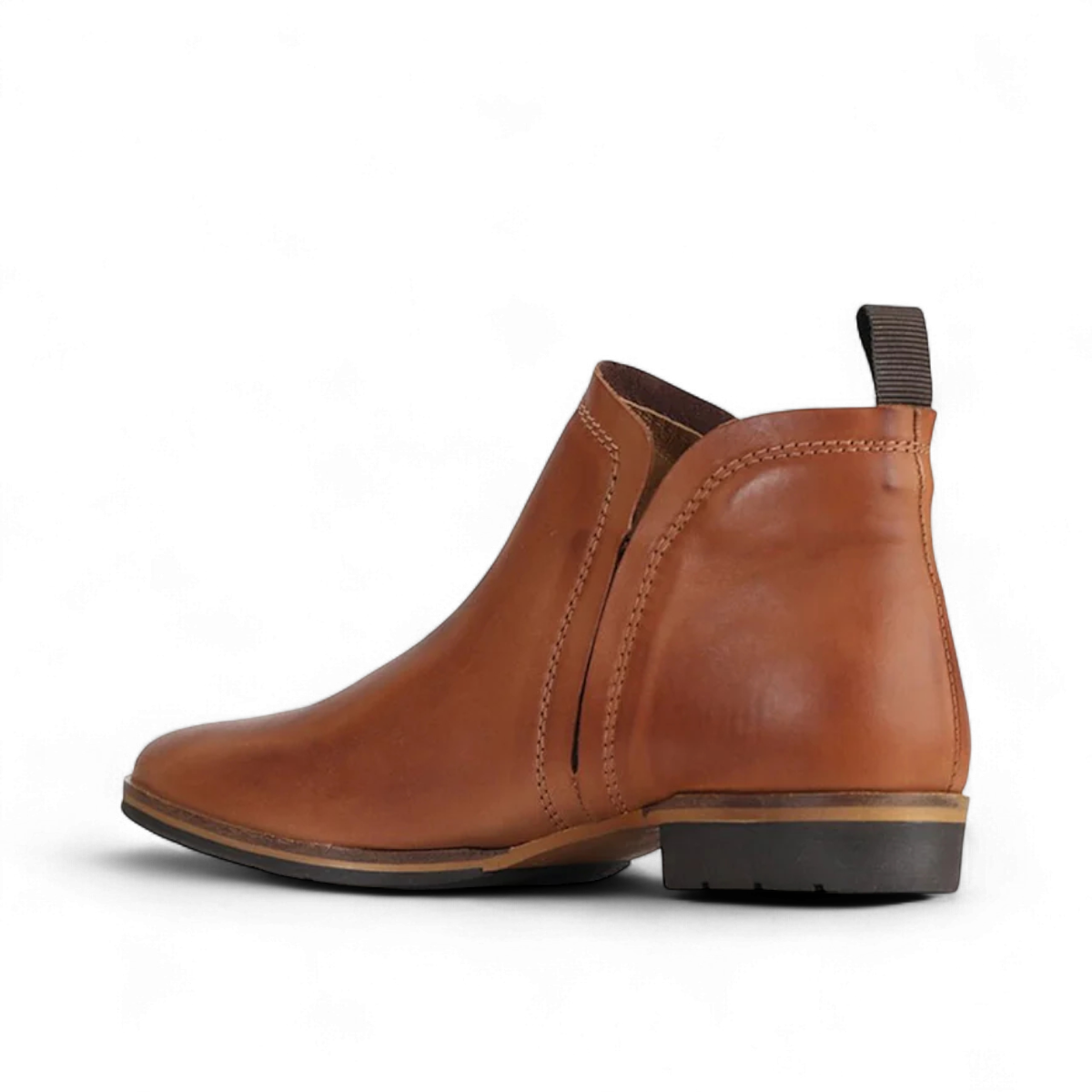 EOS MELBORN GAID brandy leather ankle boots with elastic side gussets and a pull tab on a rubber outsole. Photo of left side view.