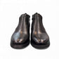 Exon Caspian black leather ankle boots for men with a rubber outsole and side zipper detail. Photo of front view.