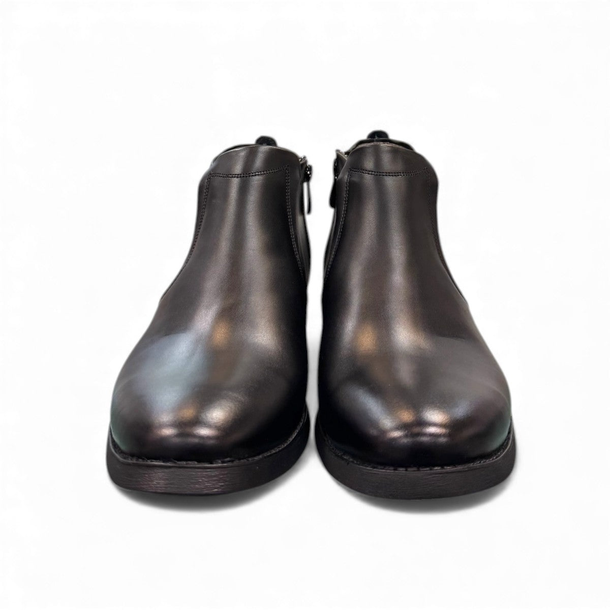 Exon Caspian black leather ankle boots for men with a rubber outsole and side zipper detail. Photo of front view.