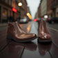 Exon Caspian dark brown leather ankle boots for men with a durable rubber outsole and side branding. Photo of front side view 2.