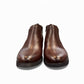 Exon Caspian dark brown leather ankle boots for men with a durable rubber outsole and side branding. Photo of front view.