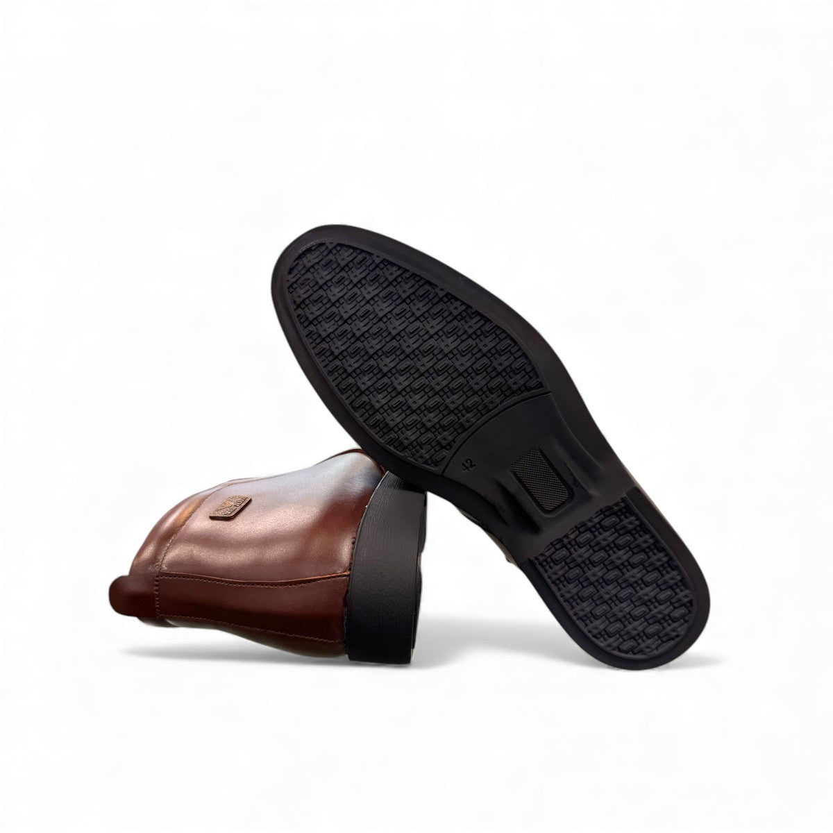 Exon Caspian dark brown leather ankle boots for men with a durable rubber outsole and side branding. Photo of bottom view.