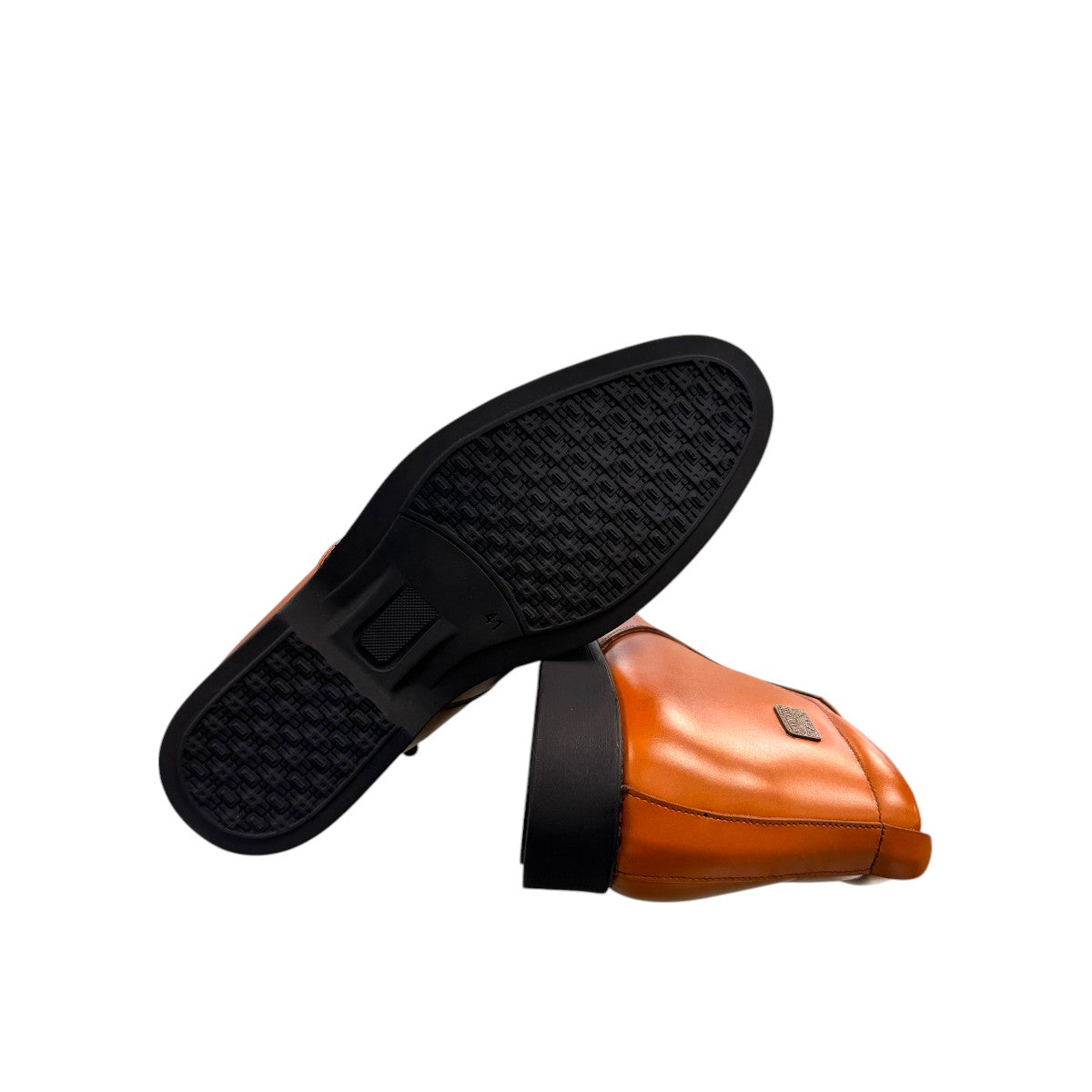 Exon Caspian light brown leather ankle boots with a rubber outsole and side detail. Photo of bottom view.