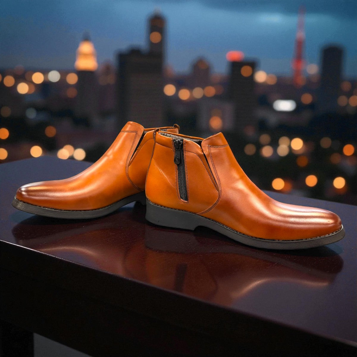 Exon Caspian light brown leather ankle boots with a rubber outsole and side detail. Photo of front side view 2.