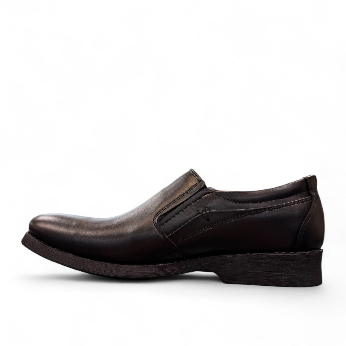 EXON ISFAHAN black leather slip-on men's shoes with rubber outsole and side logo detail. Photo of left side view.