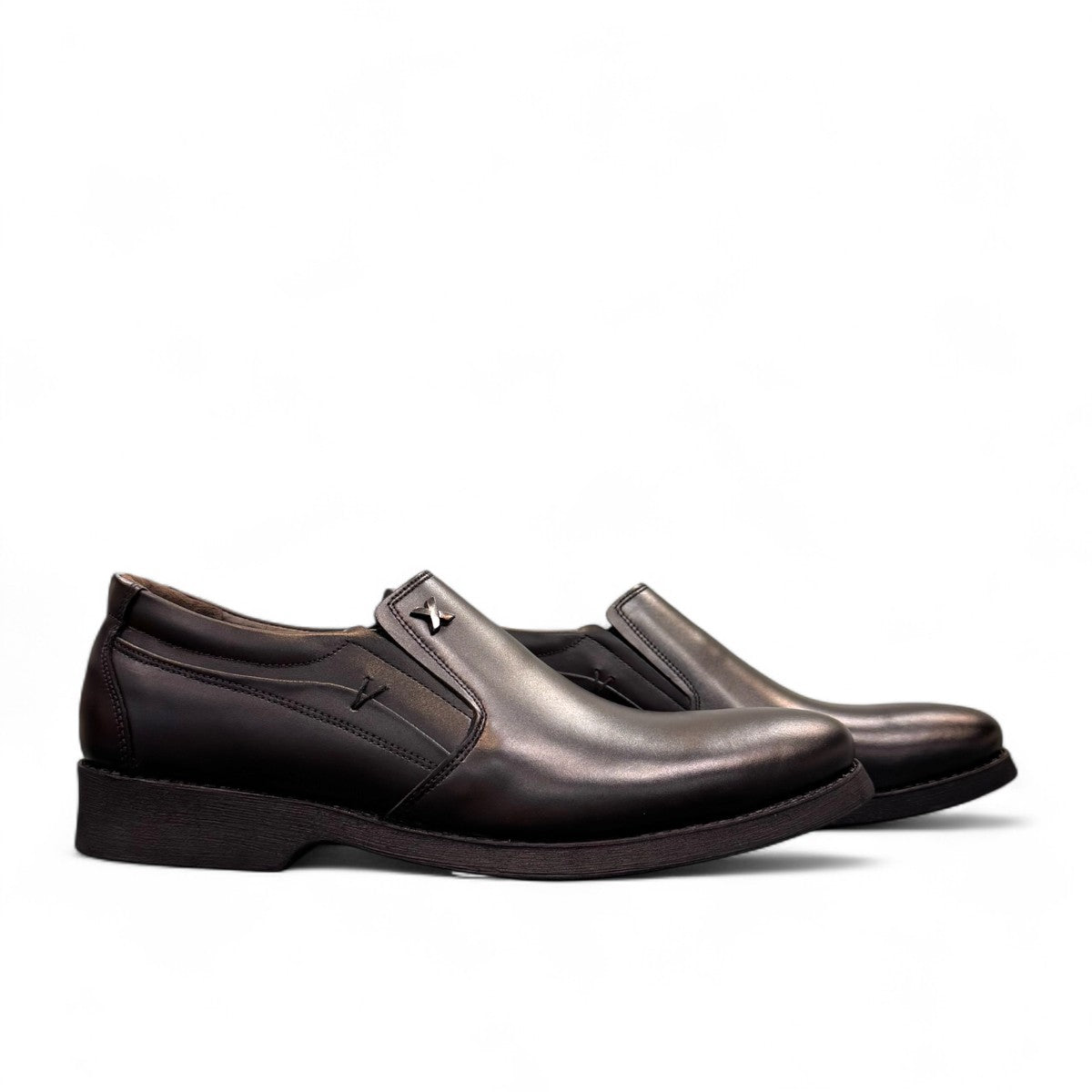 EXON ISFAHAN black leather slip-on men's shoes with rubber outsole and side logo detail. Photo of side views.
