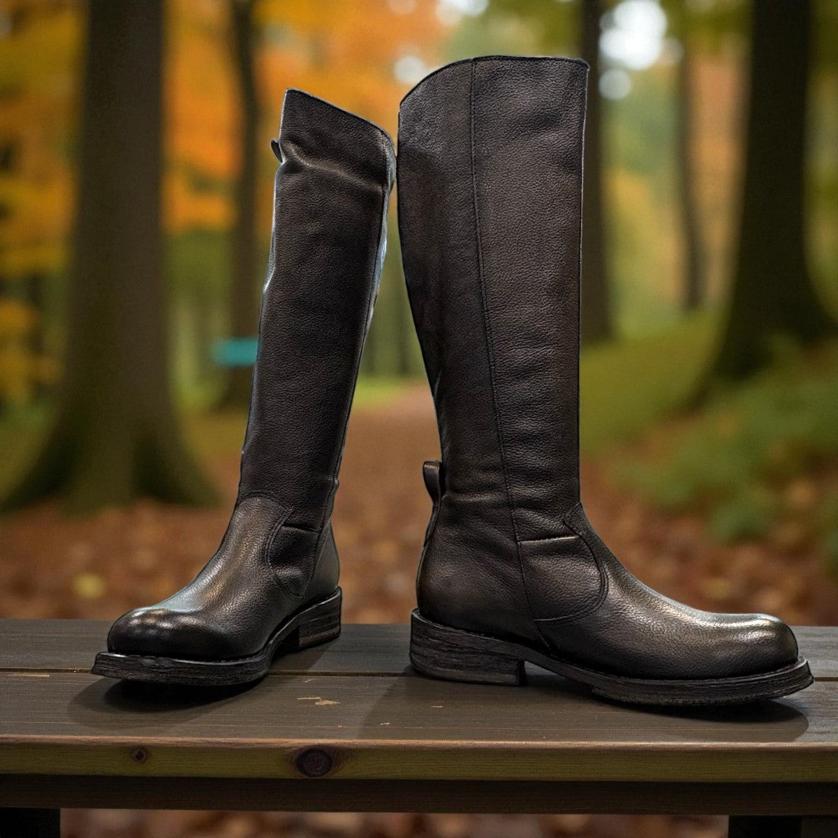 Felmini D624 black leather knee-high boots with side zipper, elastic gore, and burnished toe detail. Photo of front side view 2.