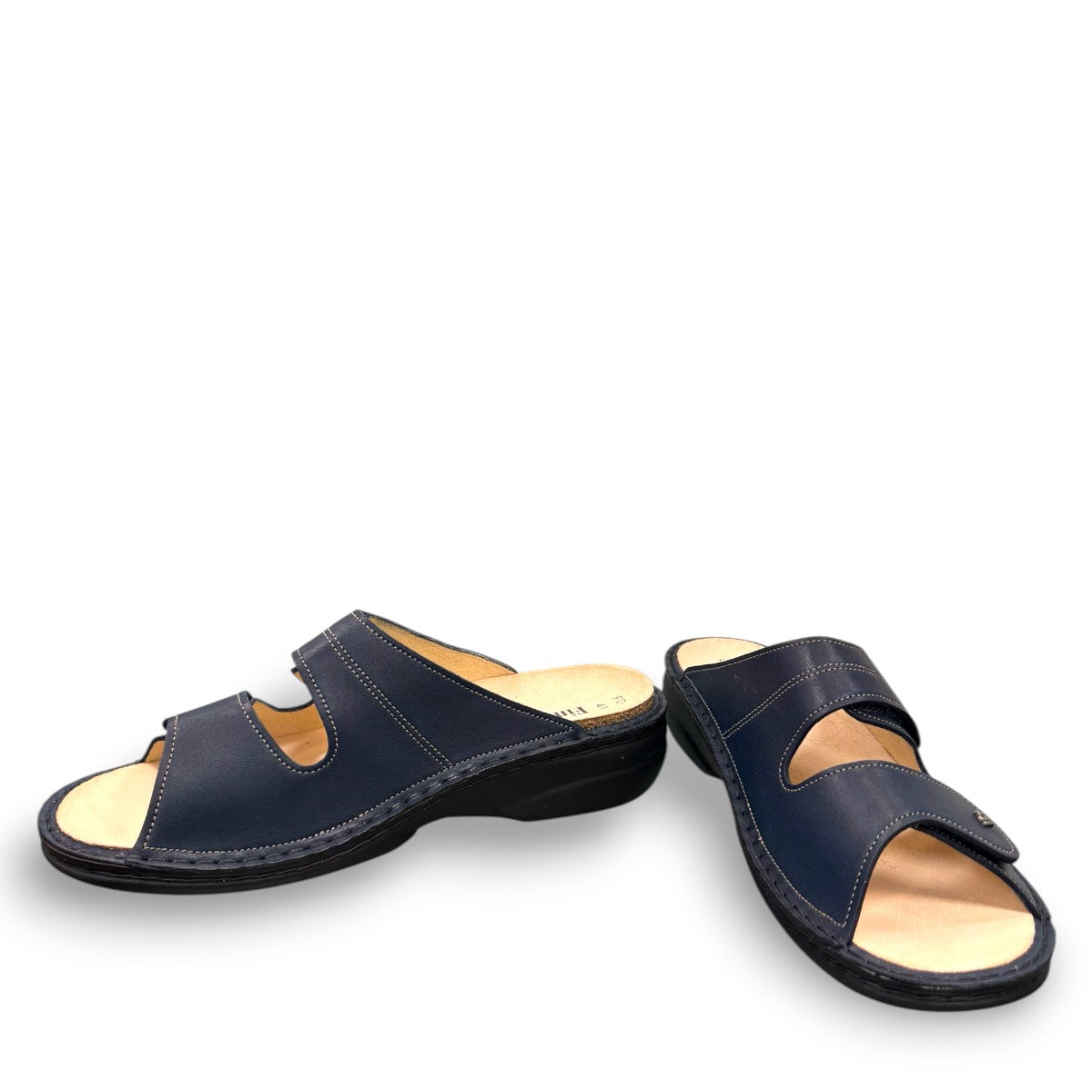 Finn Comfort Sansibar blue leather sandal with two adjustable hook and loop straps and cork footbed.
photo of the front side