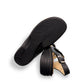 Finn Comfort Gomera black leather sandal with adjustable hook and loop straps and cork footbed.
photo of the bottom side