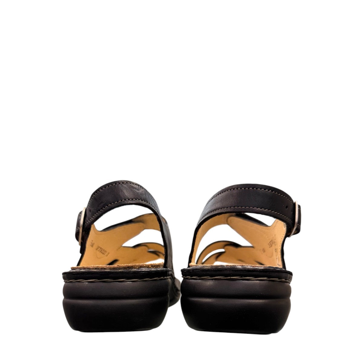 Finn Comfort Gomera black leather sandal with adjustable hook and loop straps and cork footbed.
photo of the back side