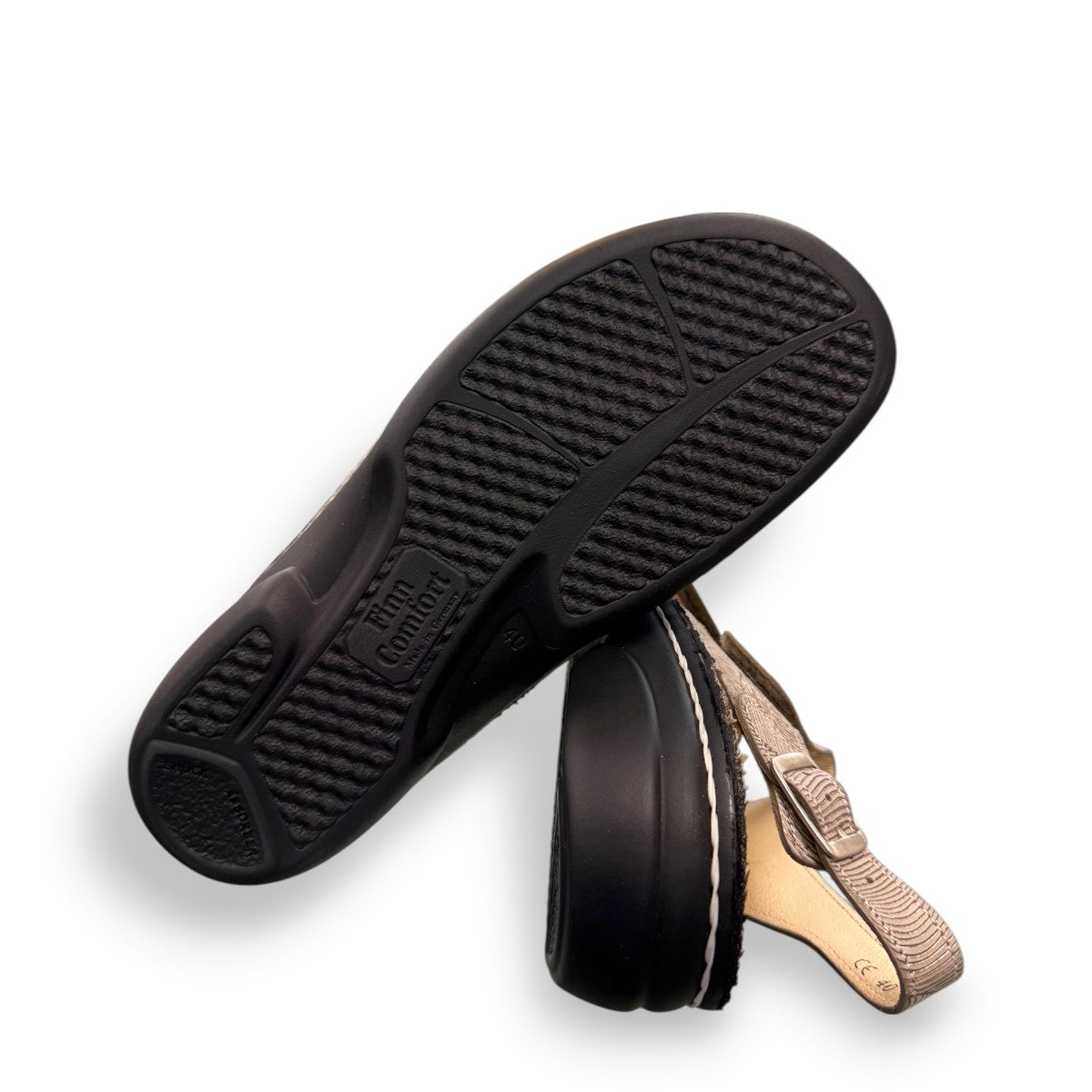 Finn Comfort Gomera sandal in storm sand leather with adjustable straps and cork footbed.
photo of the bottom side