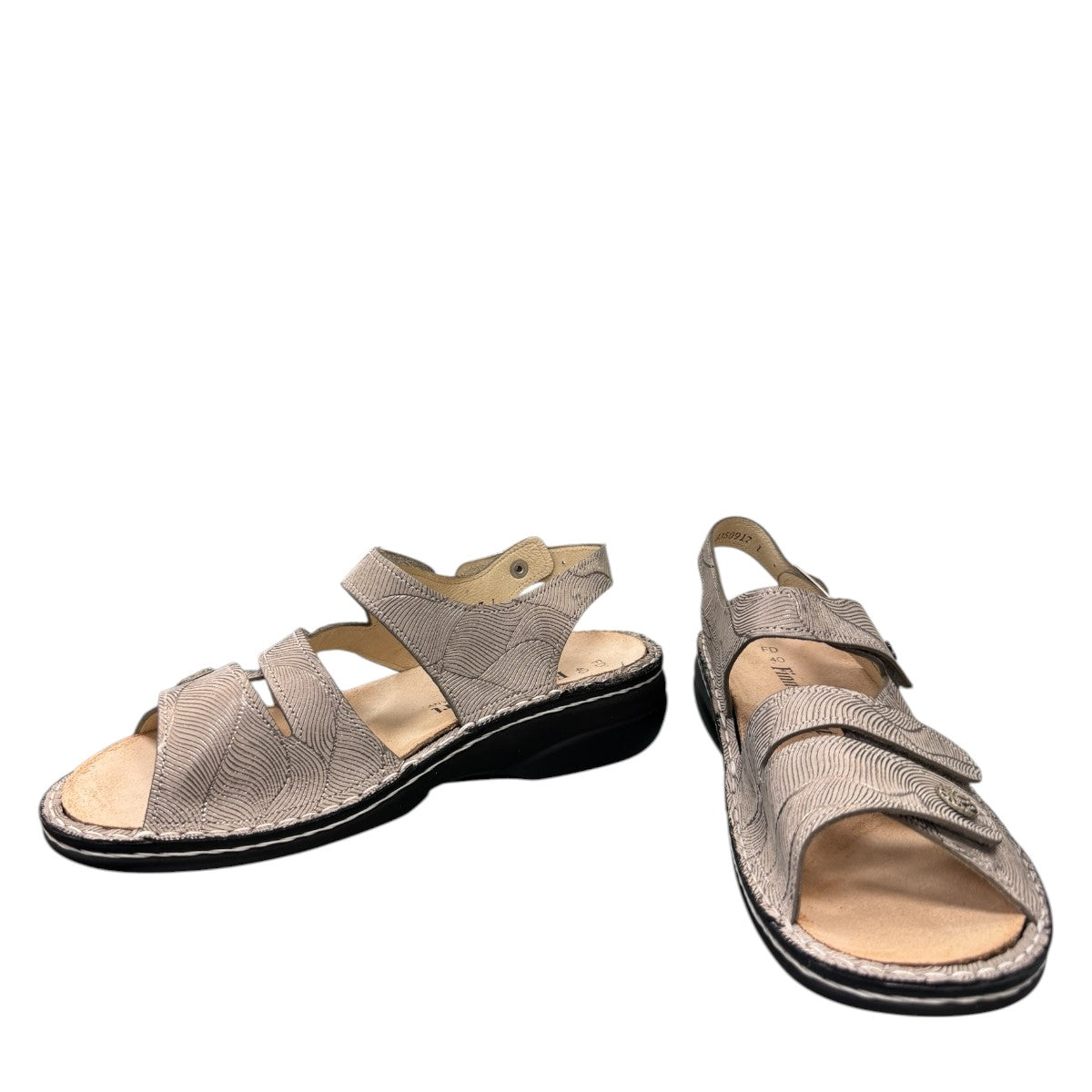 Finn Comfort Gomera sandal in storm sand leather with adjustable straps and cork footbed.
photo of the front side